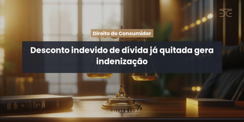 Desconto indevido de dívida já quitada gera indenização