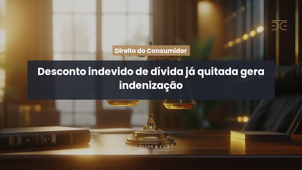 Desconto indevido de dívida já quitada gera indenização